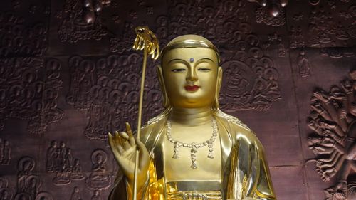 Free A golden Buddha statue inside a temple in Seoul, South Korea. Stock Photo