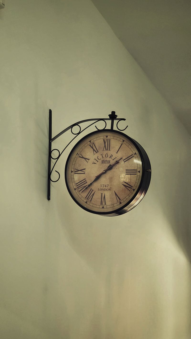 Elegant Antique Wall Clock with Roman Numerals · Free Stock Photo