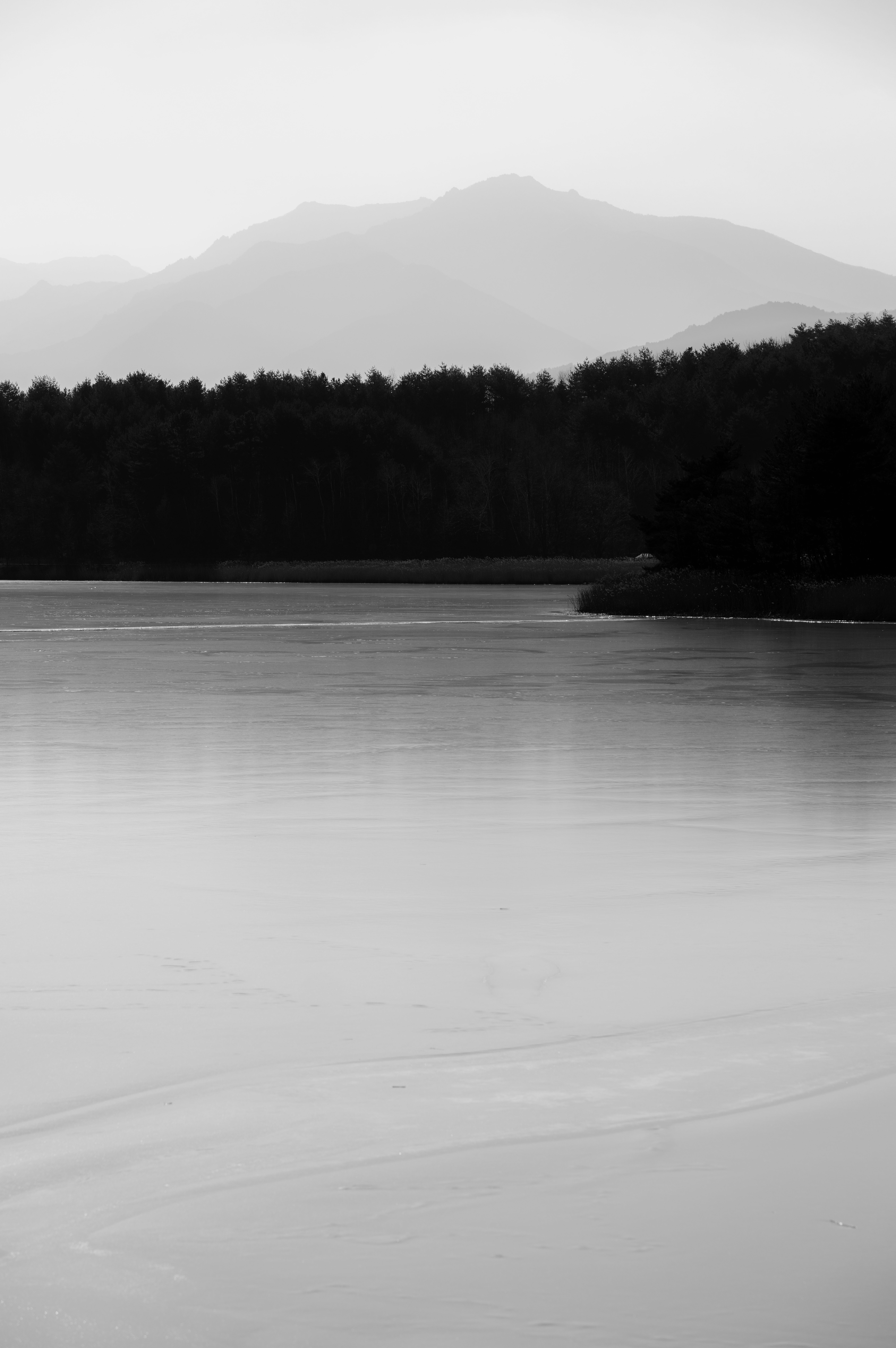 Peaceful Black and White Mountain Lake View · Free Stock Photo