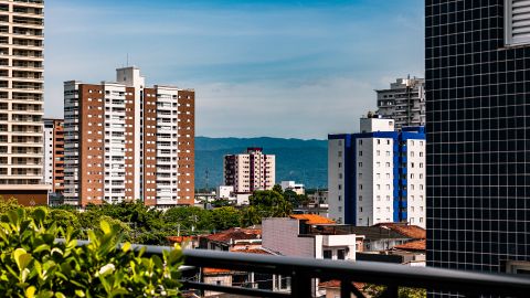 Beautiful urban skyline featuring high-rise buildings against a clear blue sky.