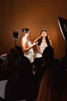 Professional makeup artist applies bridal makeup at a workshop in Mexico City.