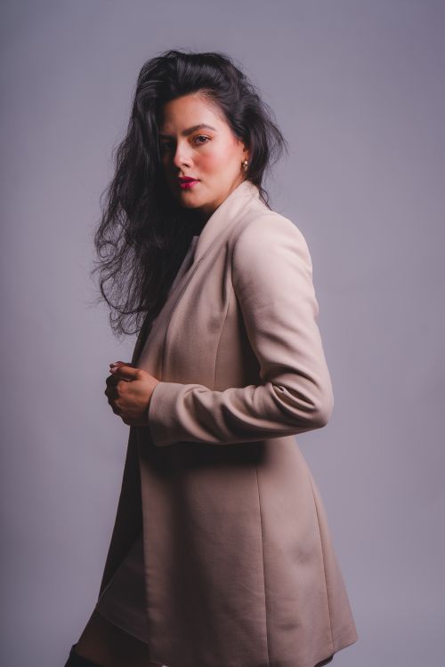 Free Stylish portrait of a woman in neutral tones, exemplifying modern fashion in Mexico City. Stock Photo