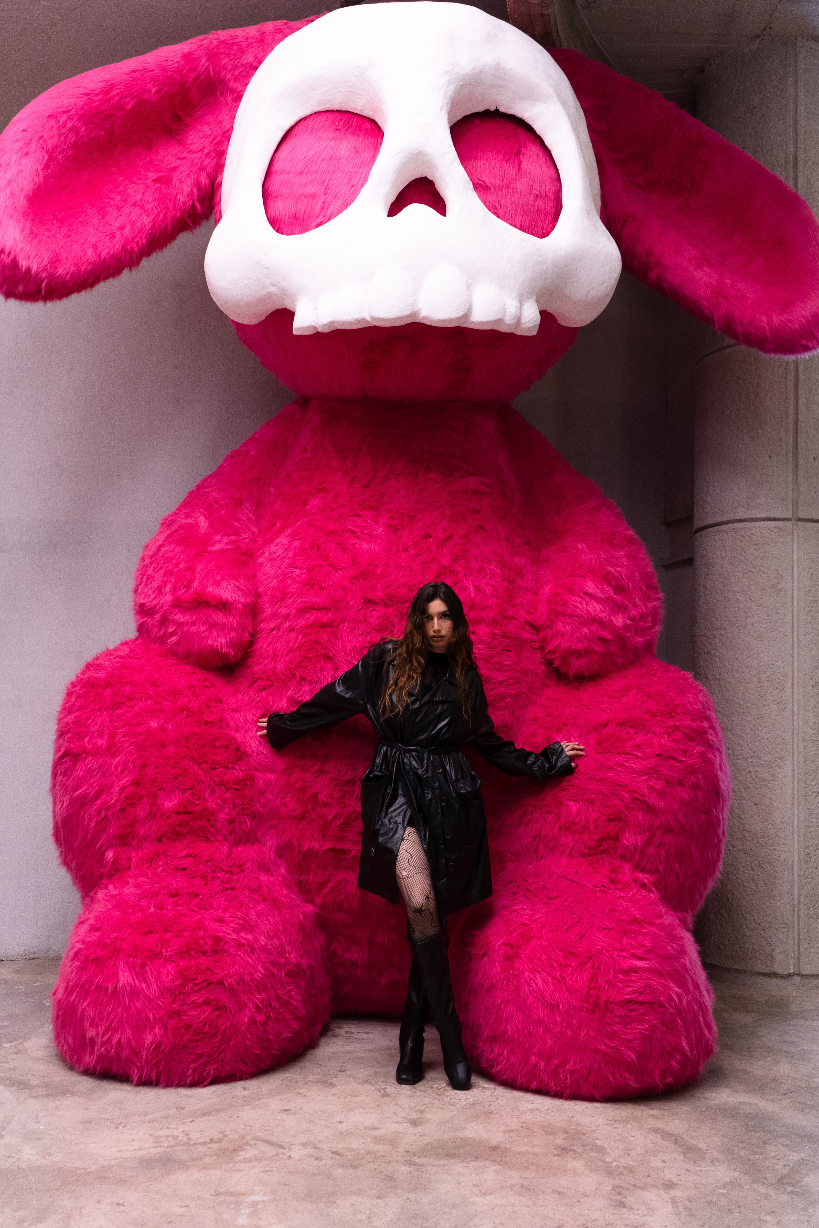 Fashion Portrait with Pink Bunny Sculpture in Museum · Free Stock Photo