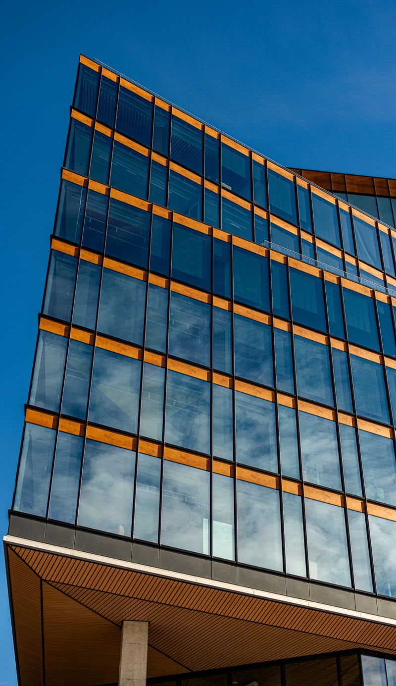 Representative photo of a commercial glass office building