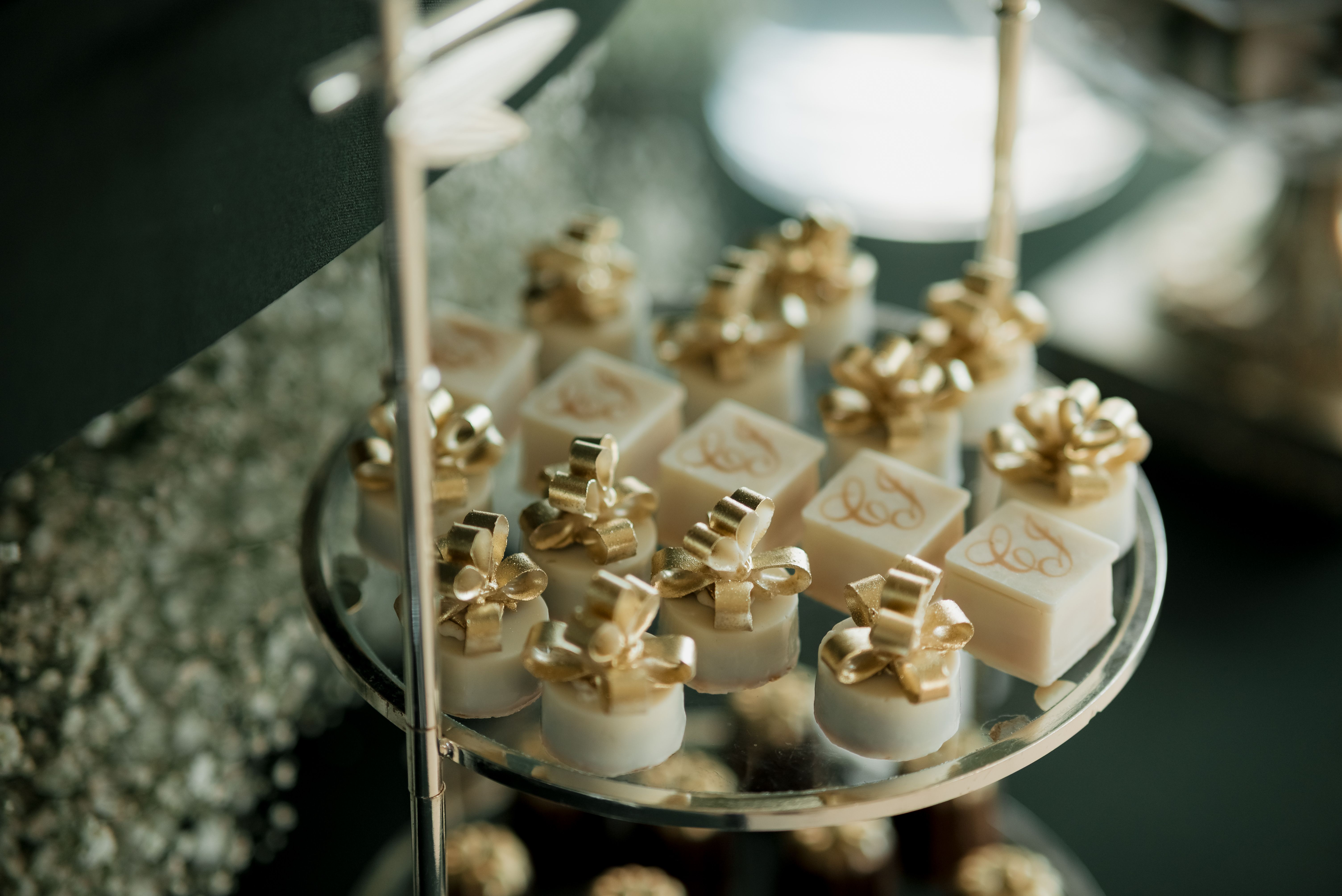 Luxurious Gold-Topped Confectionery Display · Free Stock Photo