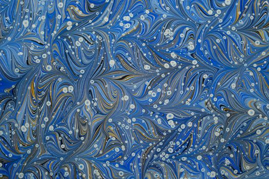 A mesmerizing abstract art piece featuring a swirling blue and white pattern with delicate details.