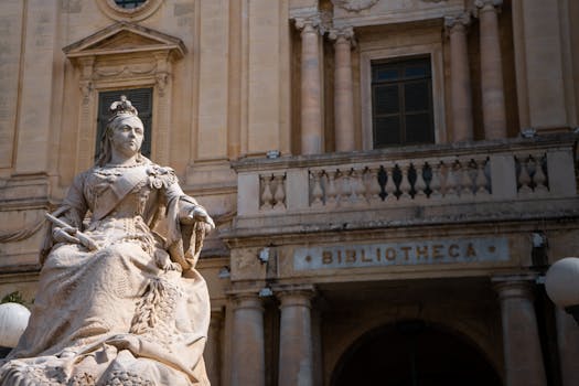Statue of Queen Victoria outside the National Library of Malta in Valletta.