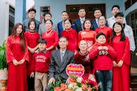 Family Gathering in Red Attire for Celebration