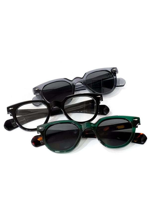 Flat lay of three pairs of acetate sunglasses on white — photo by Ri. Lens on Pexels