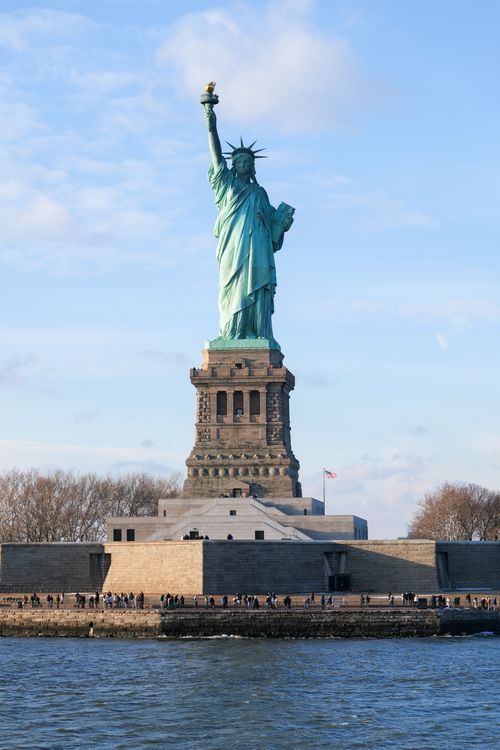 Free A stunning daylight view of the Statue of Liberty in New York City, capturing its iconic stature. Stock Photo