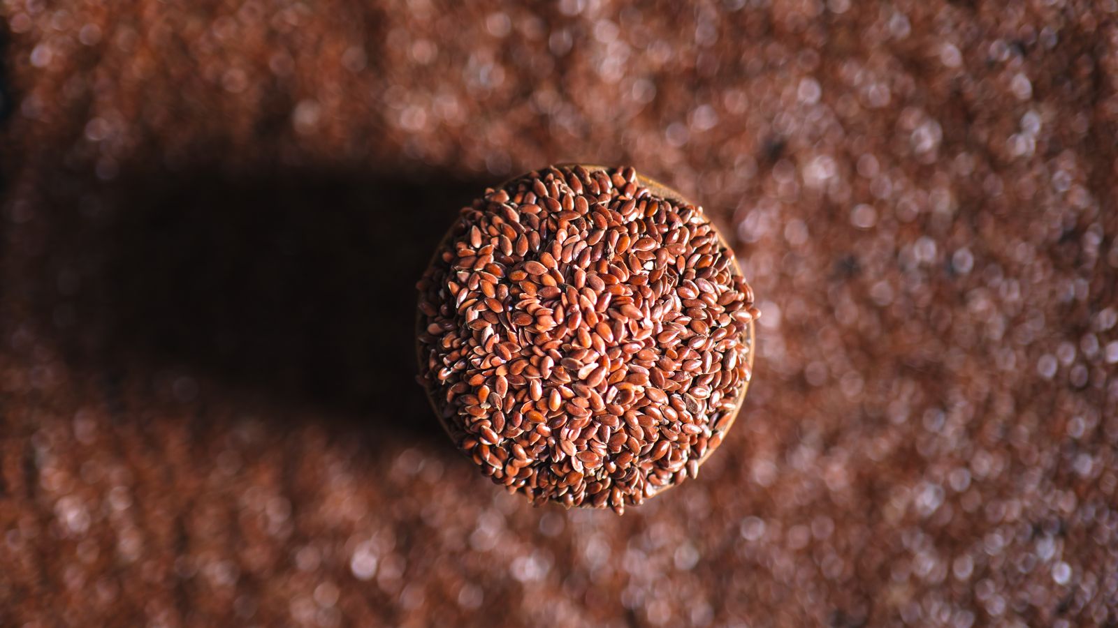 A jar of flaxseeds surrounded by scattered seeds — photo by Aneesh Thazhathethil on Pexels A jar of flaxseeds surrounded by scattered seeds