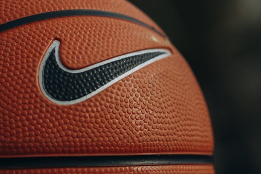 Detailed close-up shot of a basketball showing texture and brand logo.