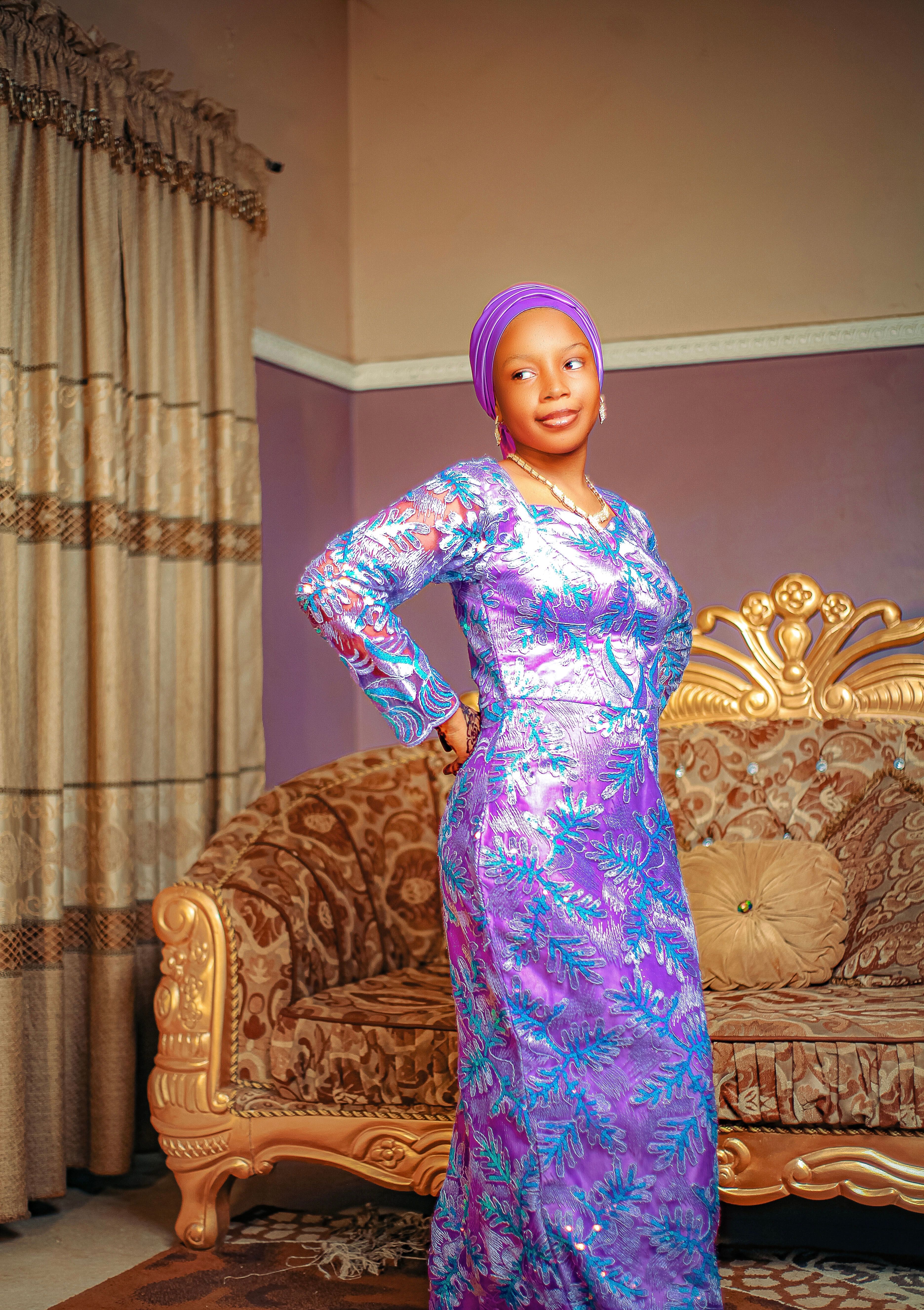 Elegant Woman in Traditional Attire Posing Indoors · Free Stock Photo