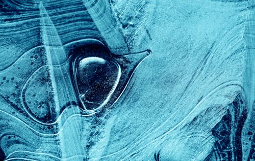 Free Close-up of a textured blue ice pattern with complex lines and shapes. Stock Photo