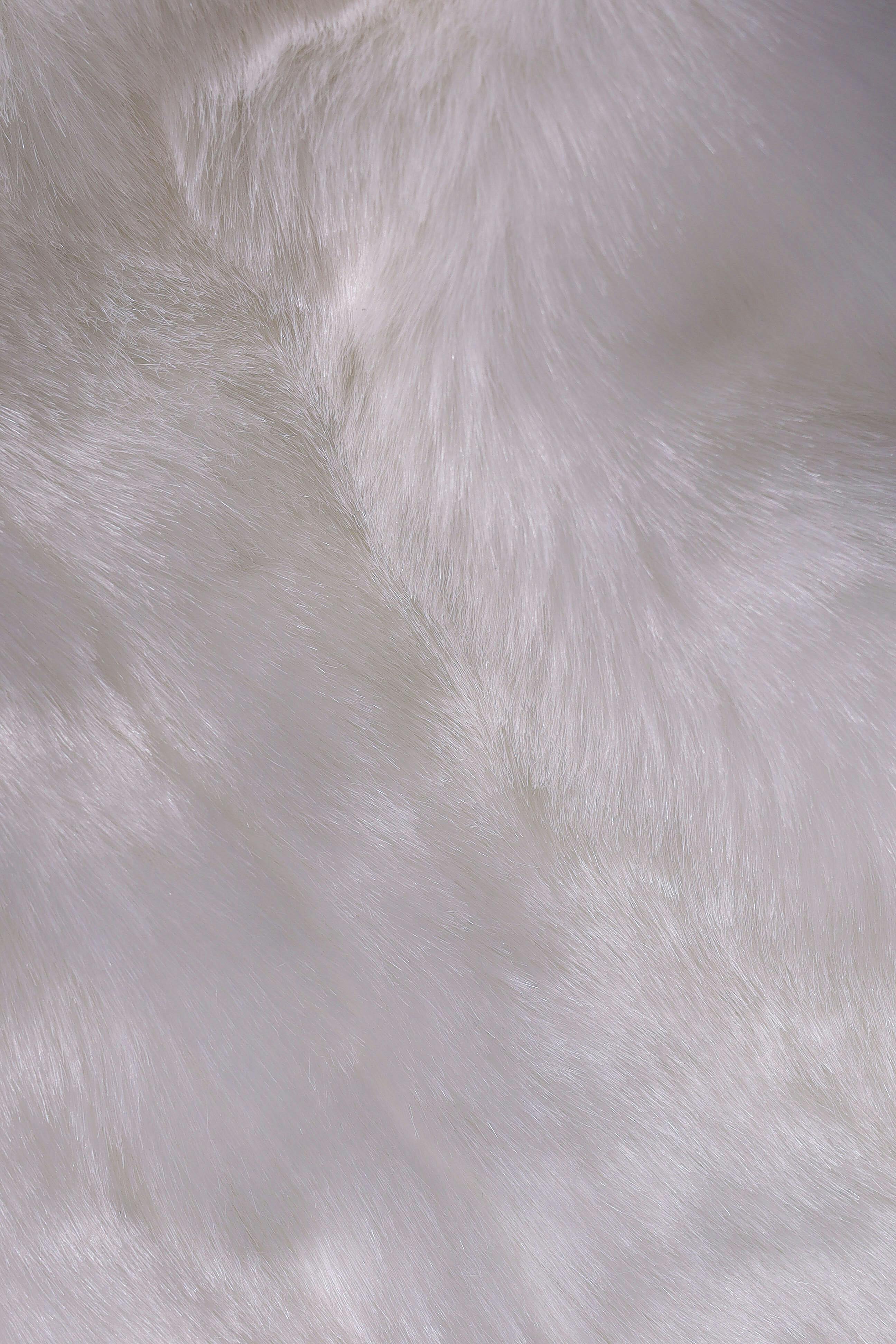 ingyenes Puha és bolyhos fehér szőr textúra, tökéletes egy hangulatos háttérhez vagy design elemhez. Stockfotó