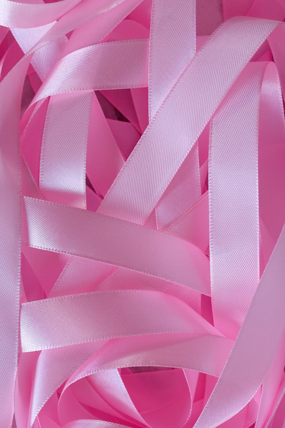 Note Pink Ribbons Soft Pink Satin Ribbons in Abstract Arrangement · Free Stock Photo