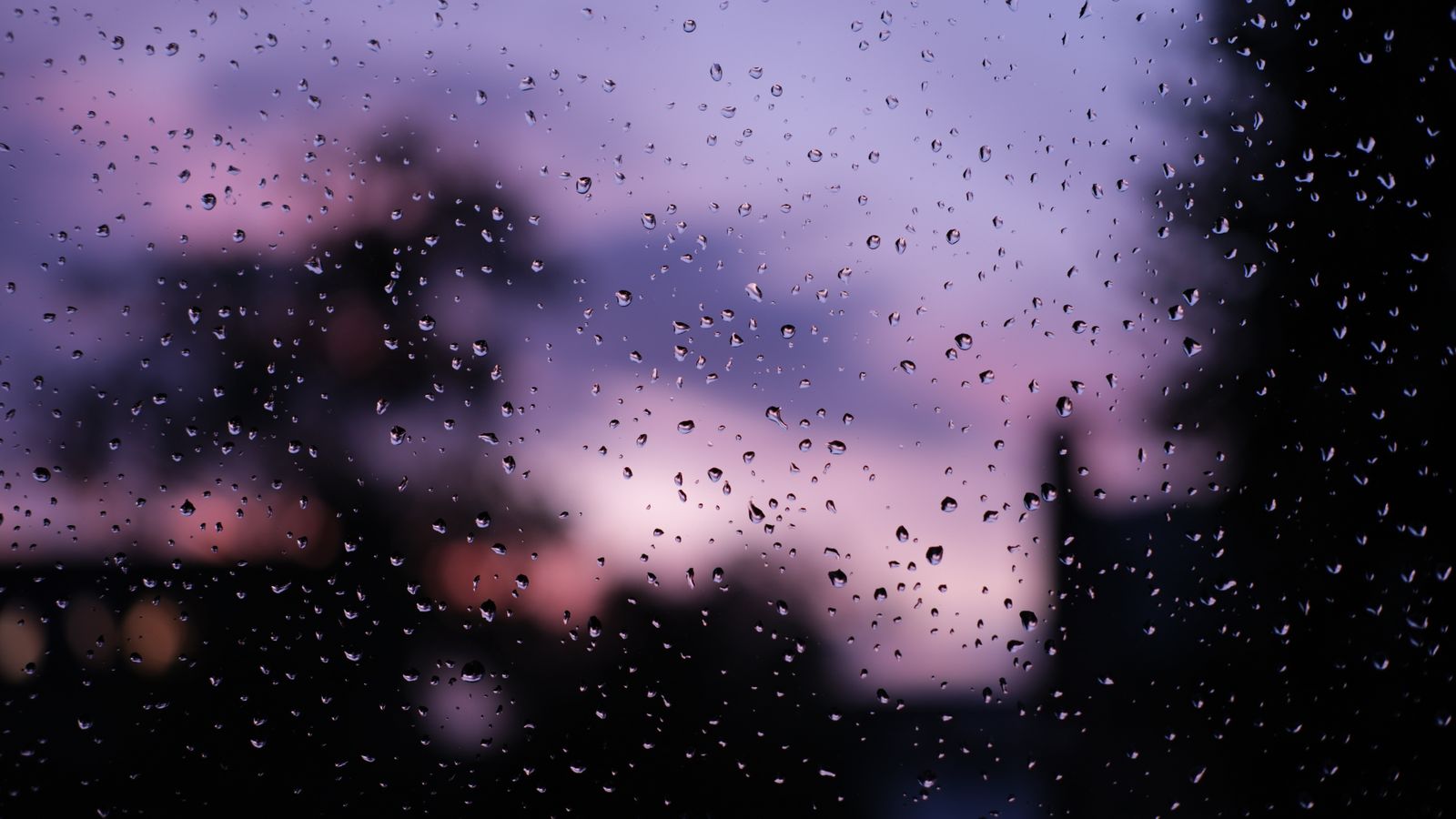 Raindrops on a Window at Sunset dark MacBook wallpaper 4K