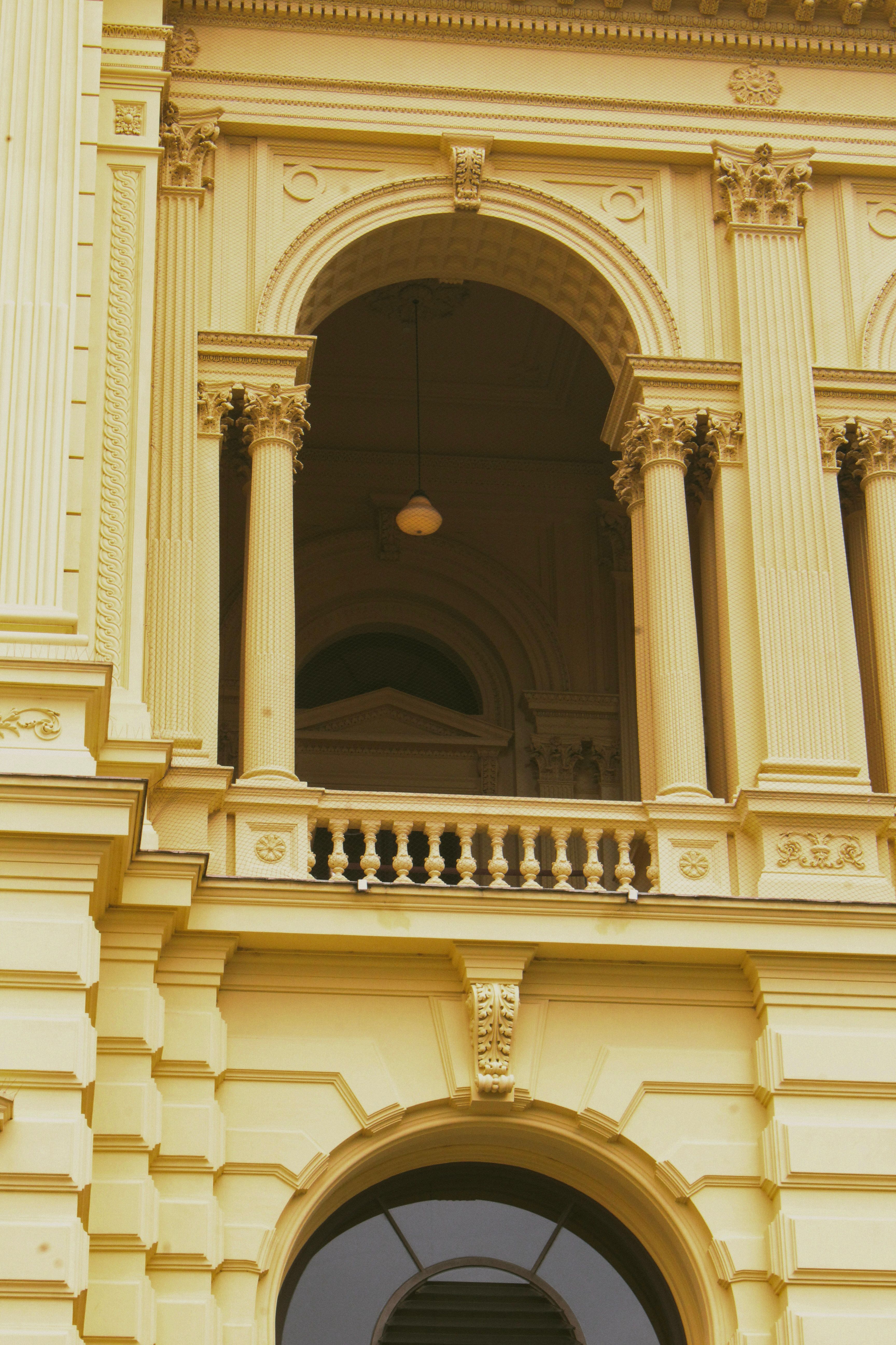 Historic Yellow Building with Classic Columns · Free Stock Photo