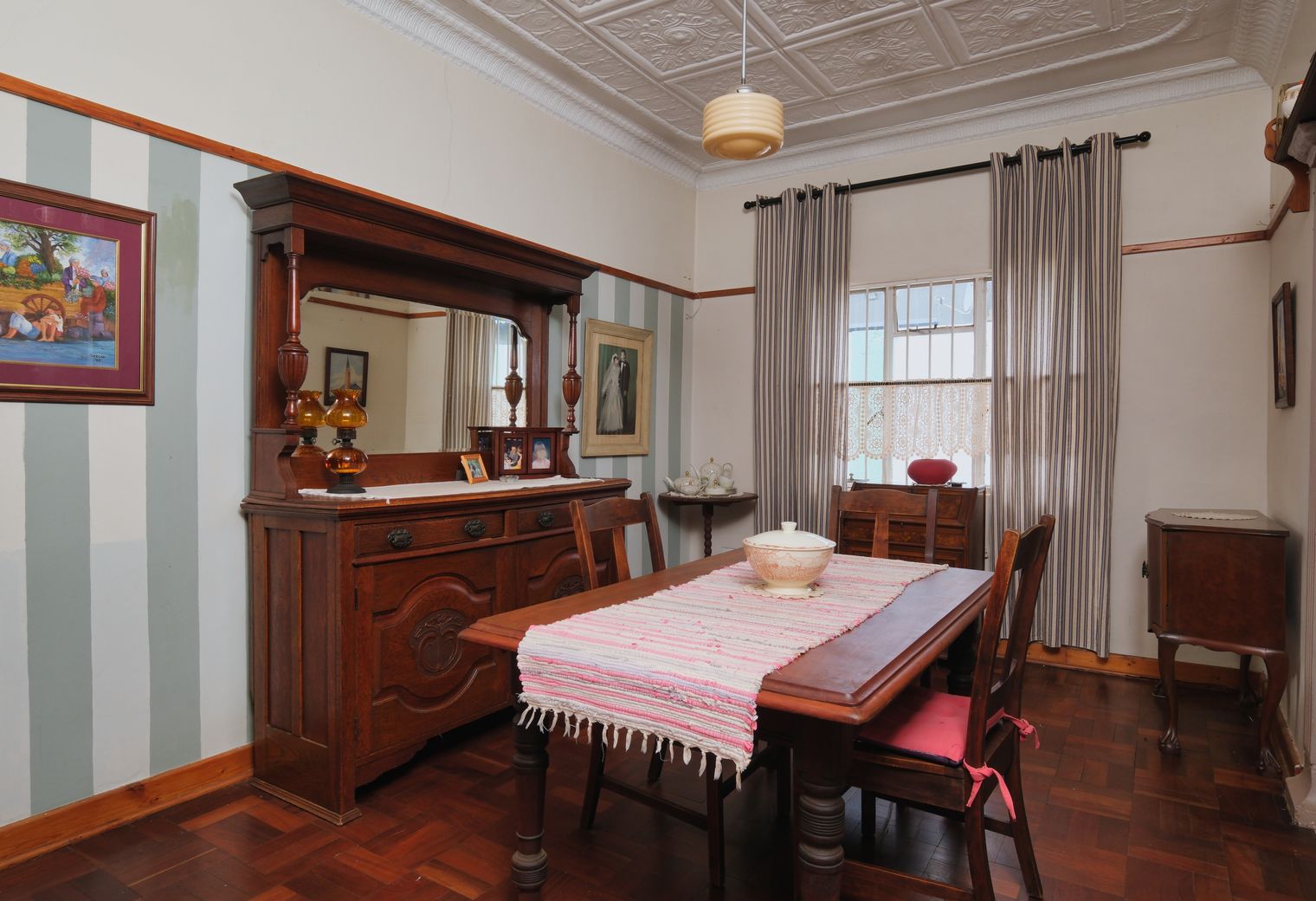 Wallpapering in Primrose Hill — quality trade paint going on in two coats