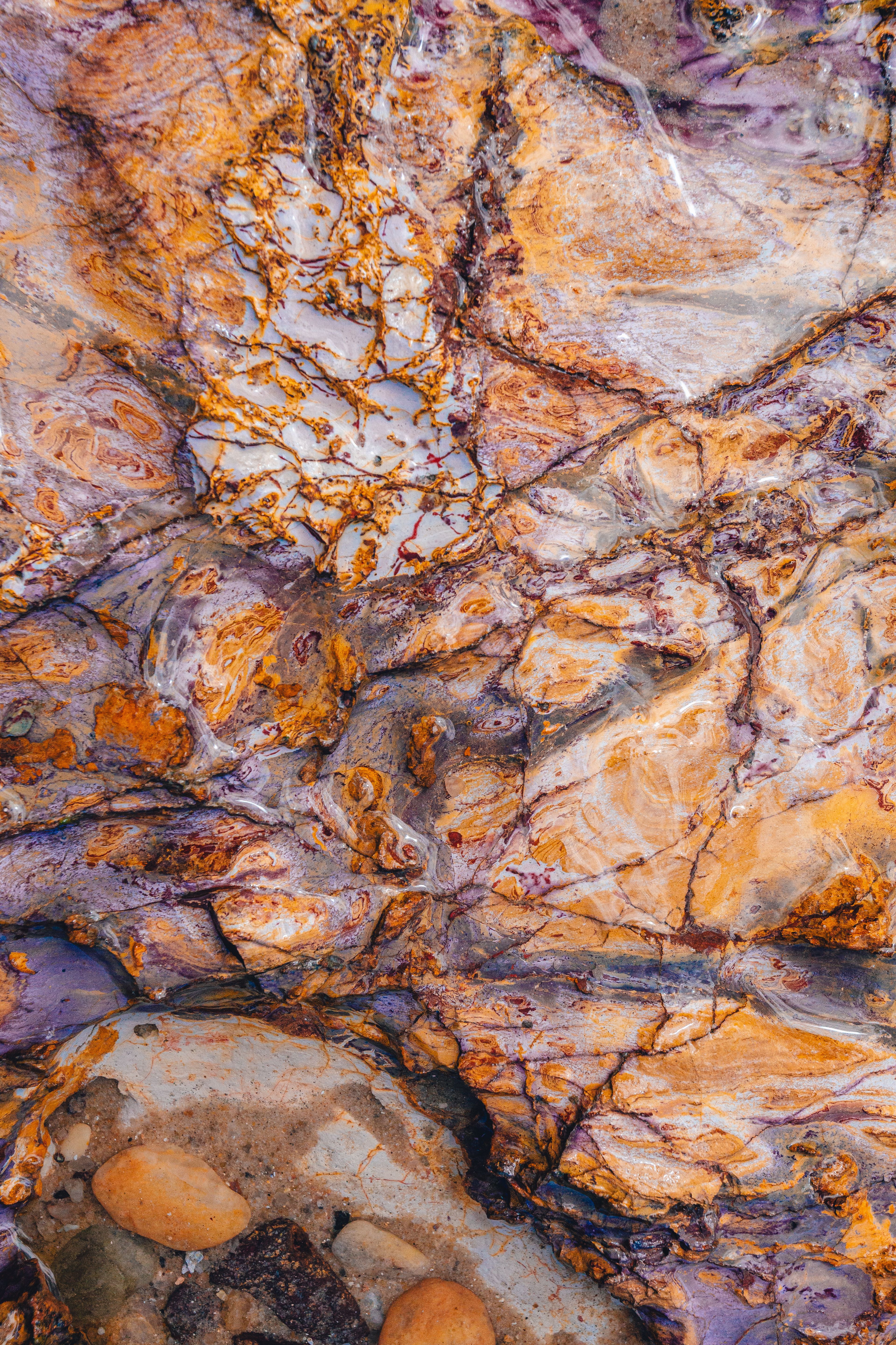 Vibrant close-up of a naturally colored stone with intricate patterns.