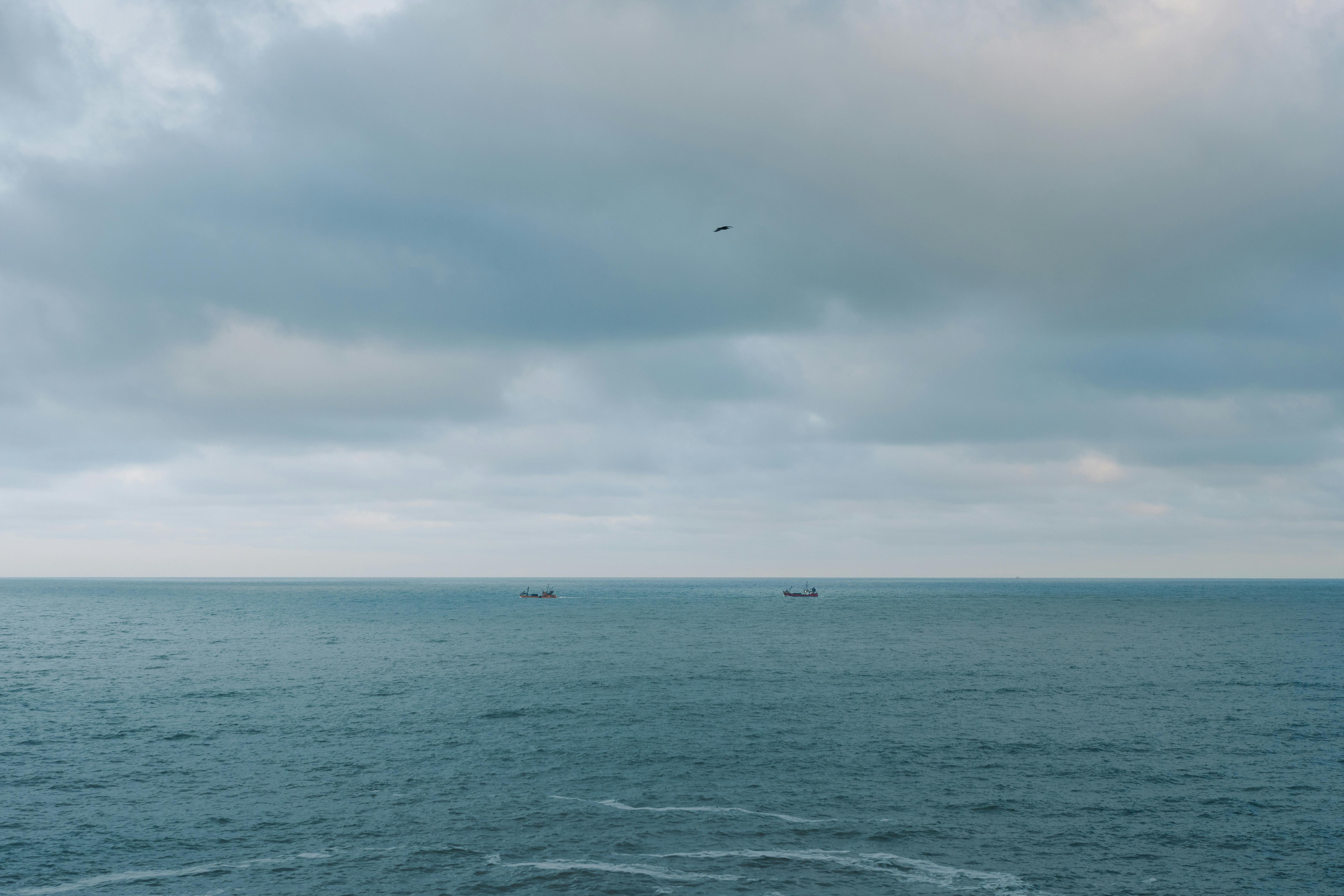 Gratis Tranquillo paesaggio oceanico a Mar del Plata, Argentina, con acque calme e cielo nuvoloso. Foto a disposizione