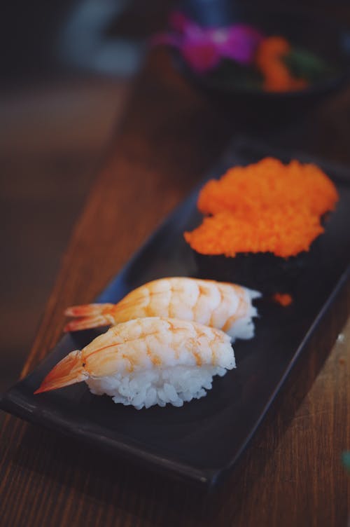 Free Prawn Sushi on Black Platter Stock Photo