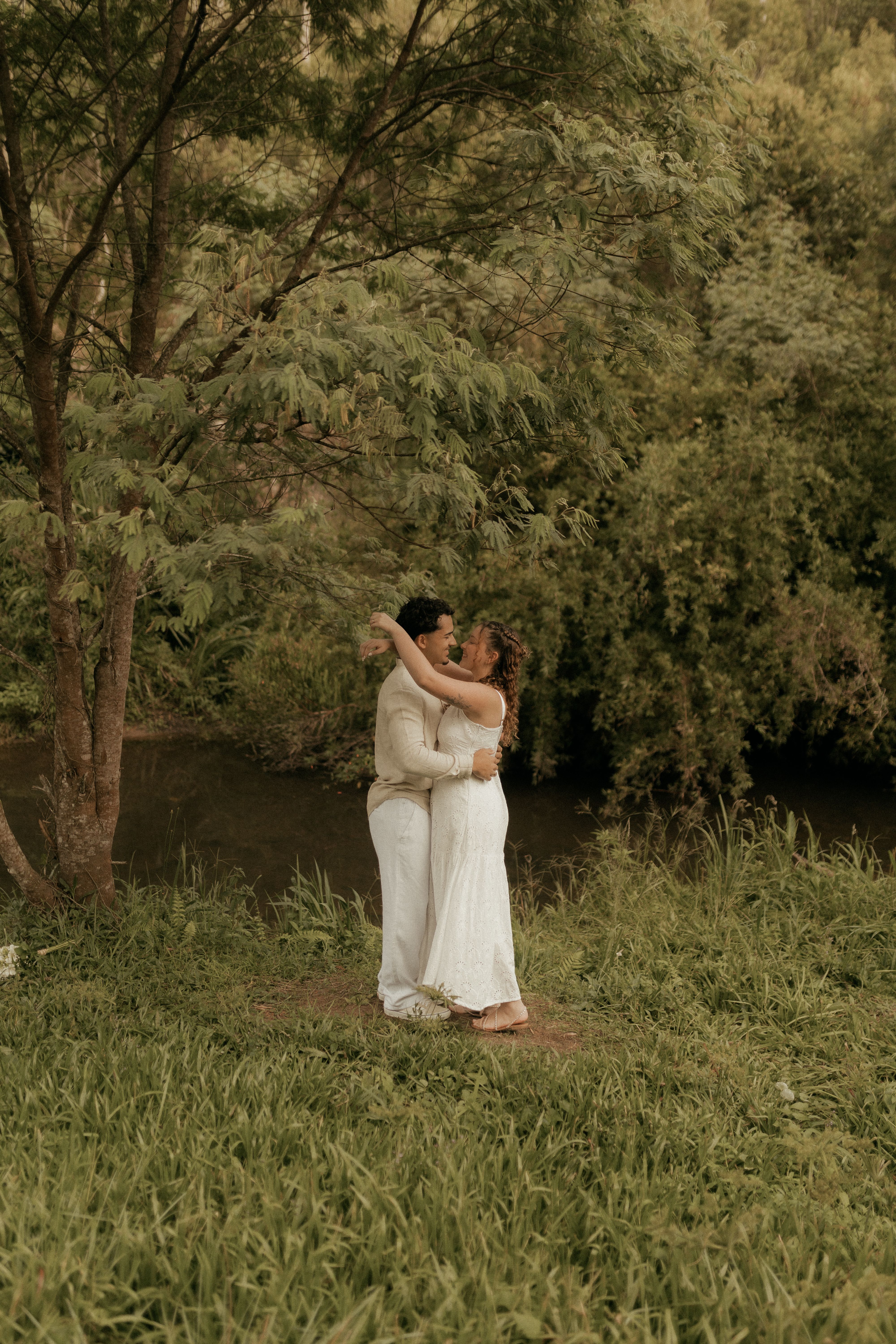 Romantic Couple Embracing in Nature Setting · Free Stock Photo