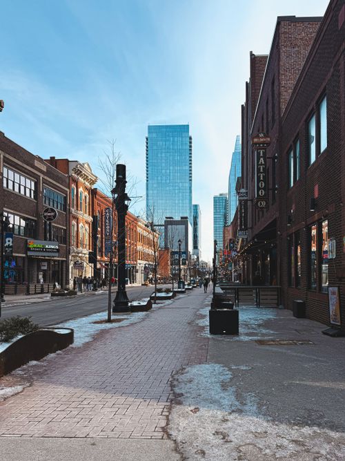 Free Vibrant downtown Nashville showing historic and modern architecture on a sunny day. Stock Photo