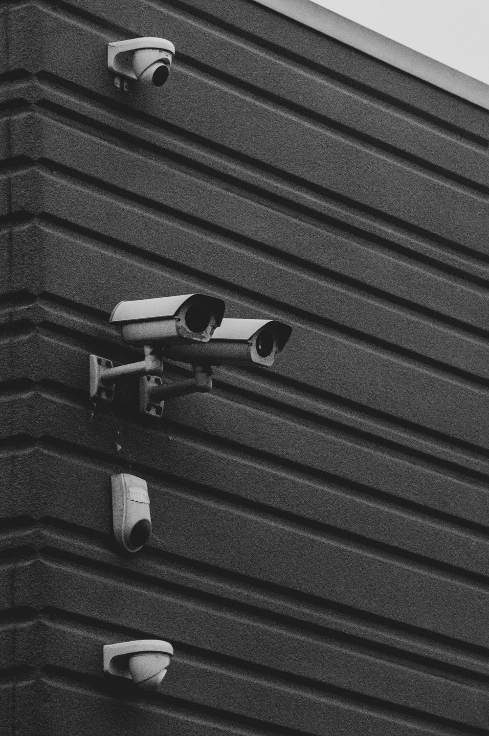 Surveillance cameras on a building
