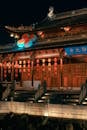 Traditional Chinese Temple at Night with Lanterns