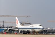 Air China Boeing 747 at Airport Construction Site