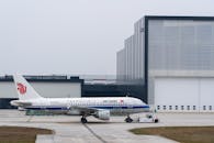 Air China Plane at Airport Hangar