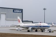 Air China Airbus A320 at Airport Hangar