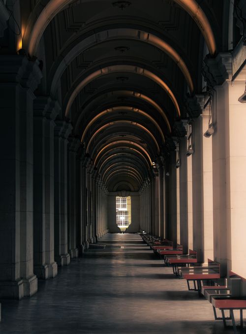 Free Stunning architectural corridor featuring elegant arches and natural lighting. Stock Photo