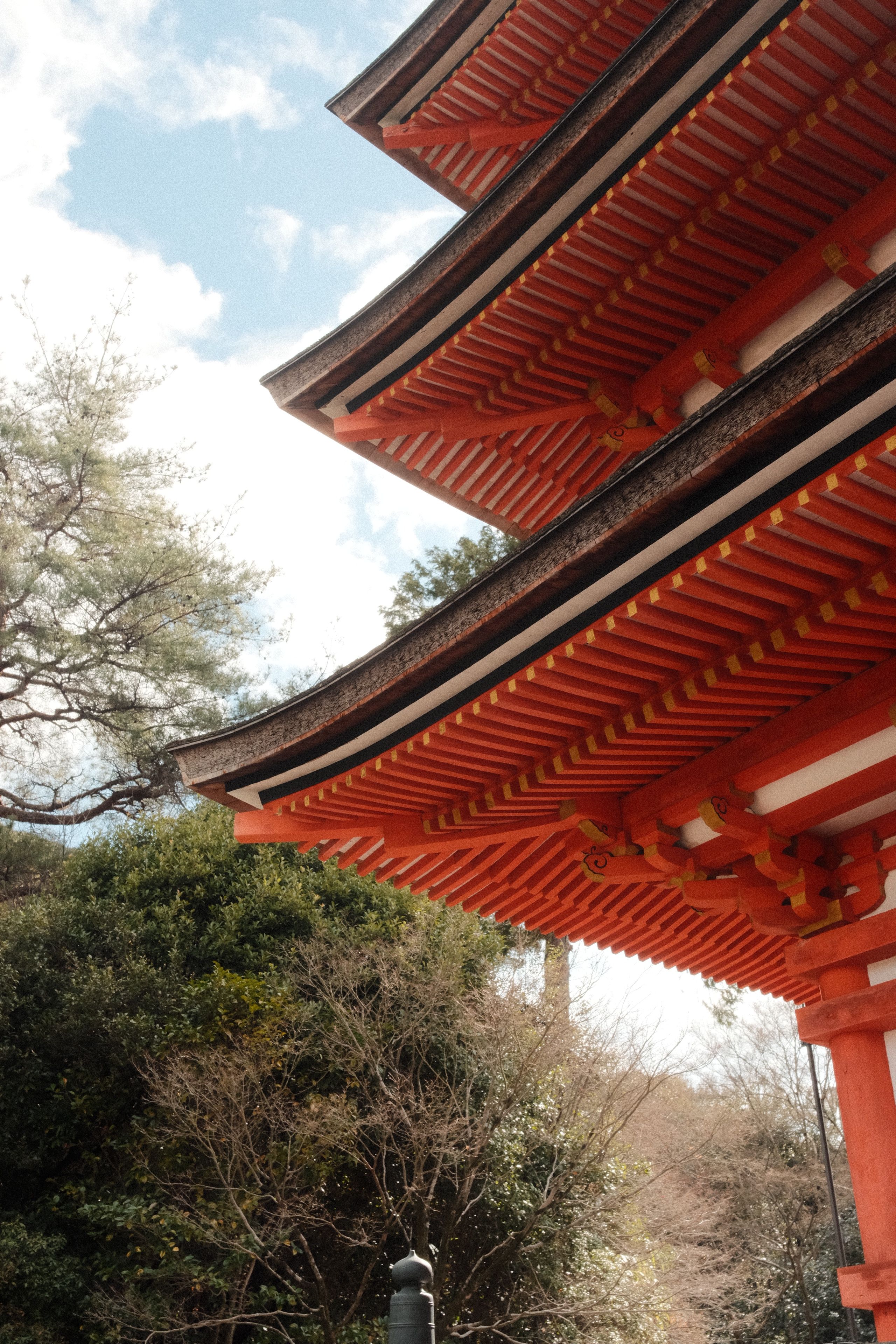 Traditional Japanese Pagoda Against Blue Sky · Free Stock Photo
