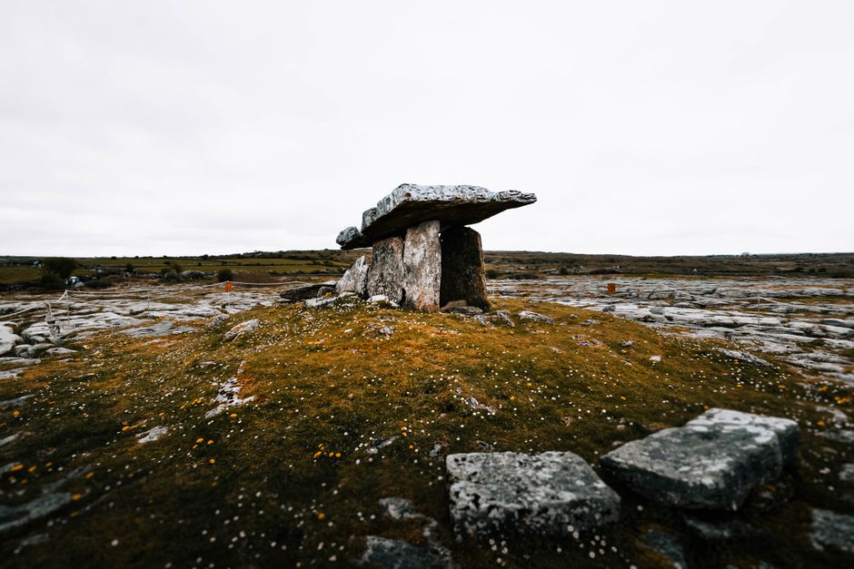 Landscape of Poulnabrone Dolmen in The Burren, a famous megalithic tomb, County Clare, Ireland. Landscape of Poulnabrone Dolmen in The Burren, a famous megalithic tomb, County Clare, Ireland.