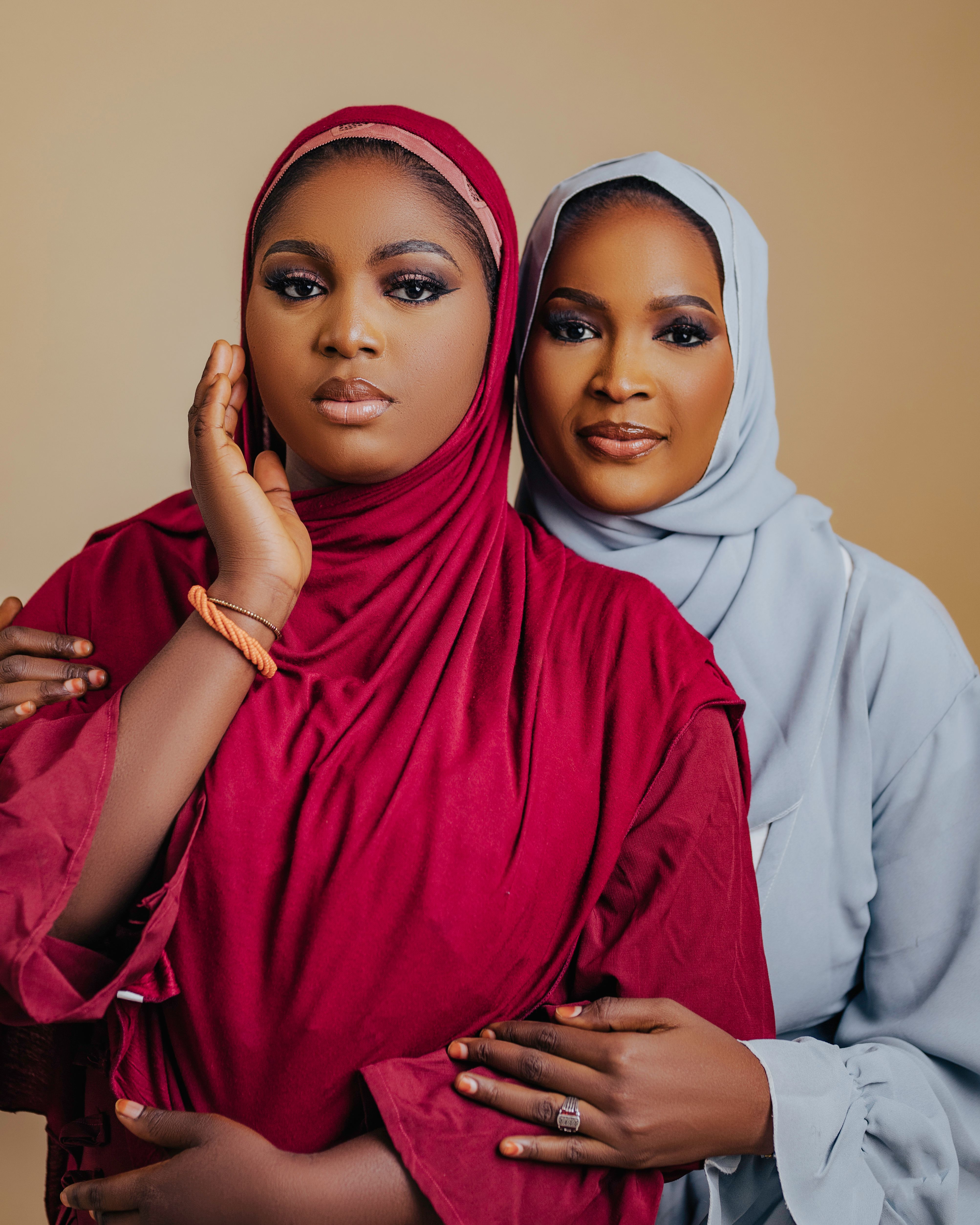 Elegant Portrait of Two Women in Traditional Attire · Free Stock Photo