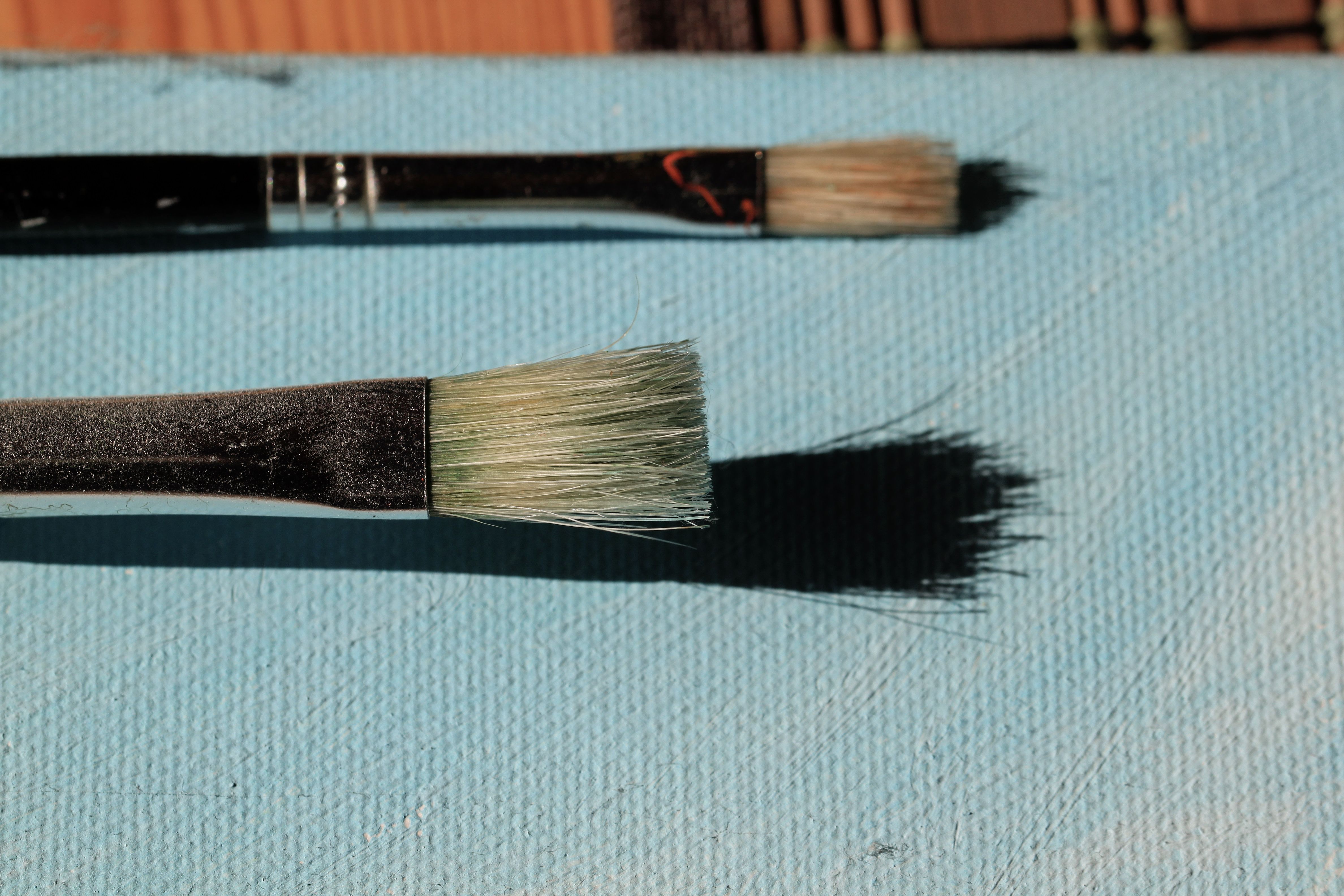 A size 0 round does most of the fine work in a kit, and it is the brush that wears out first