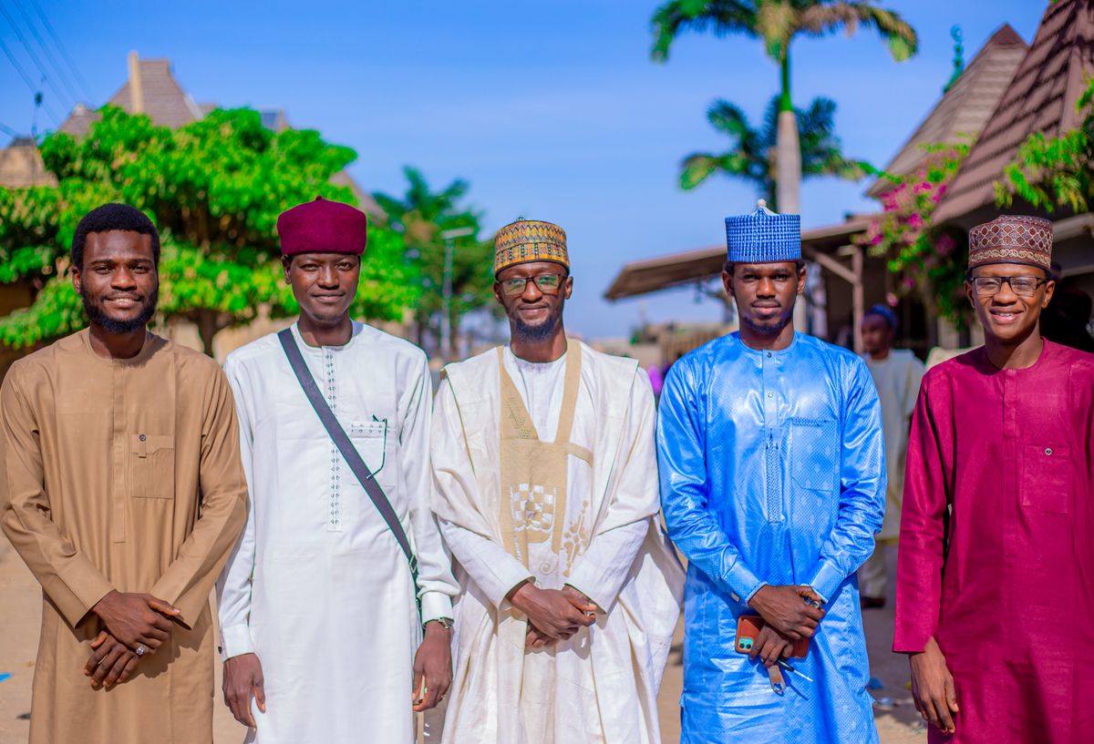 Traditional African Attire Worn by Men Indoors · Free Stock Photo