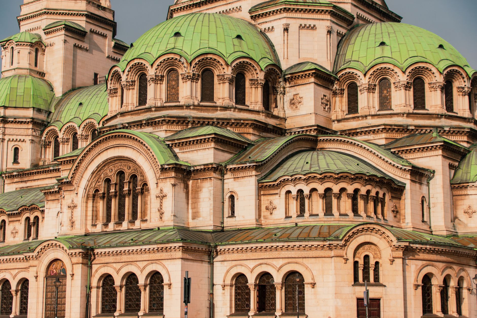 Alexander Nevsky Cathedral gold domes at dusk with Sofia rooftops