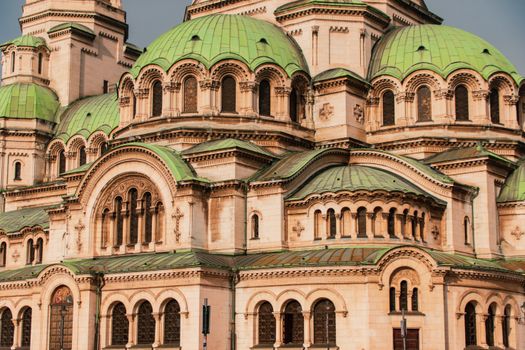 Close-up view of the stunning green domes of Alexander Nevsky Cathedral in Sofia, Bulgaria.