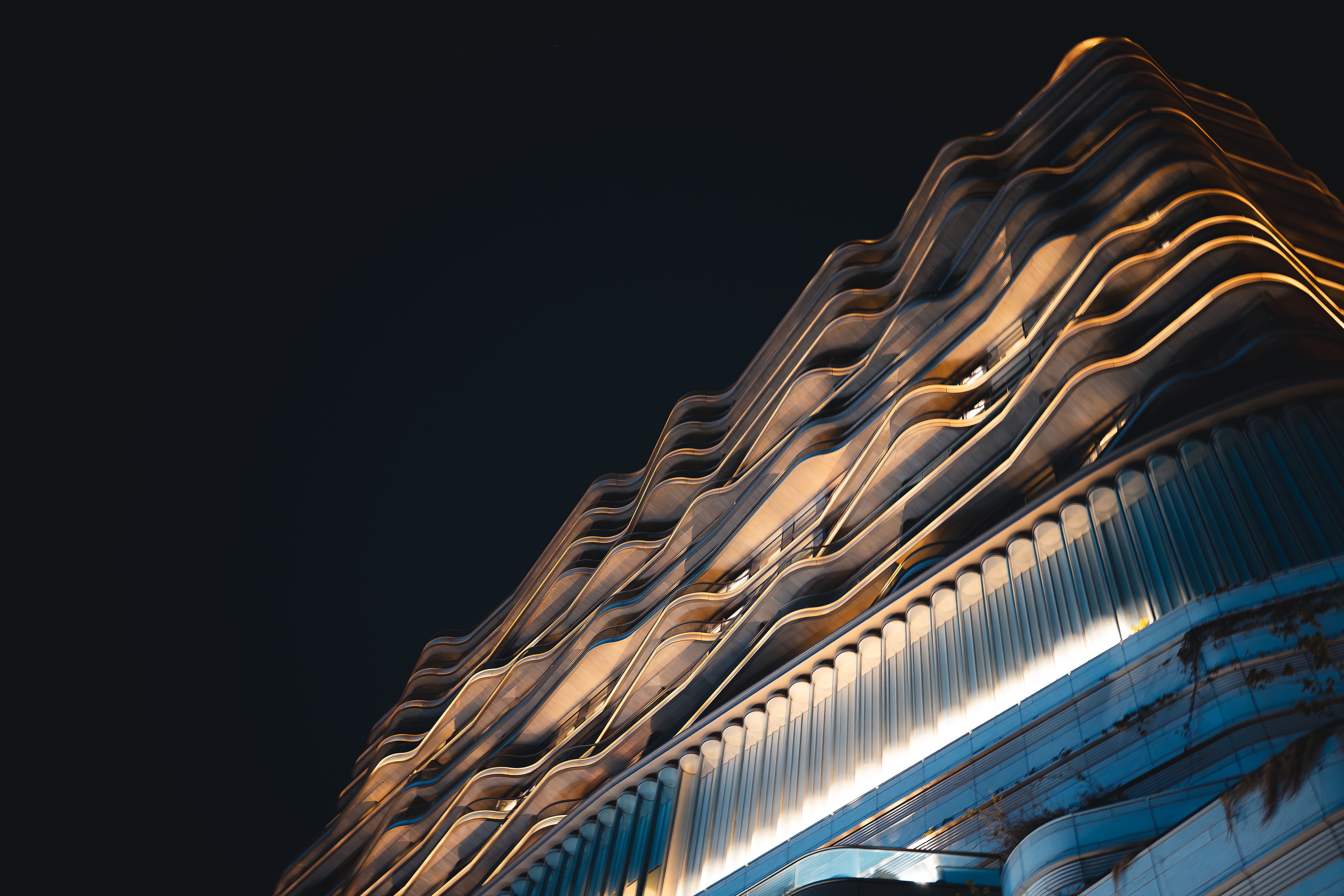 Modern Wave-like Architecture at Night in Hong Kong · Free Stock Photo