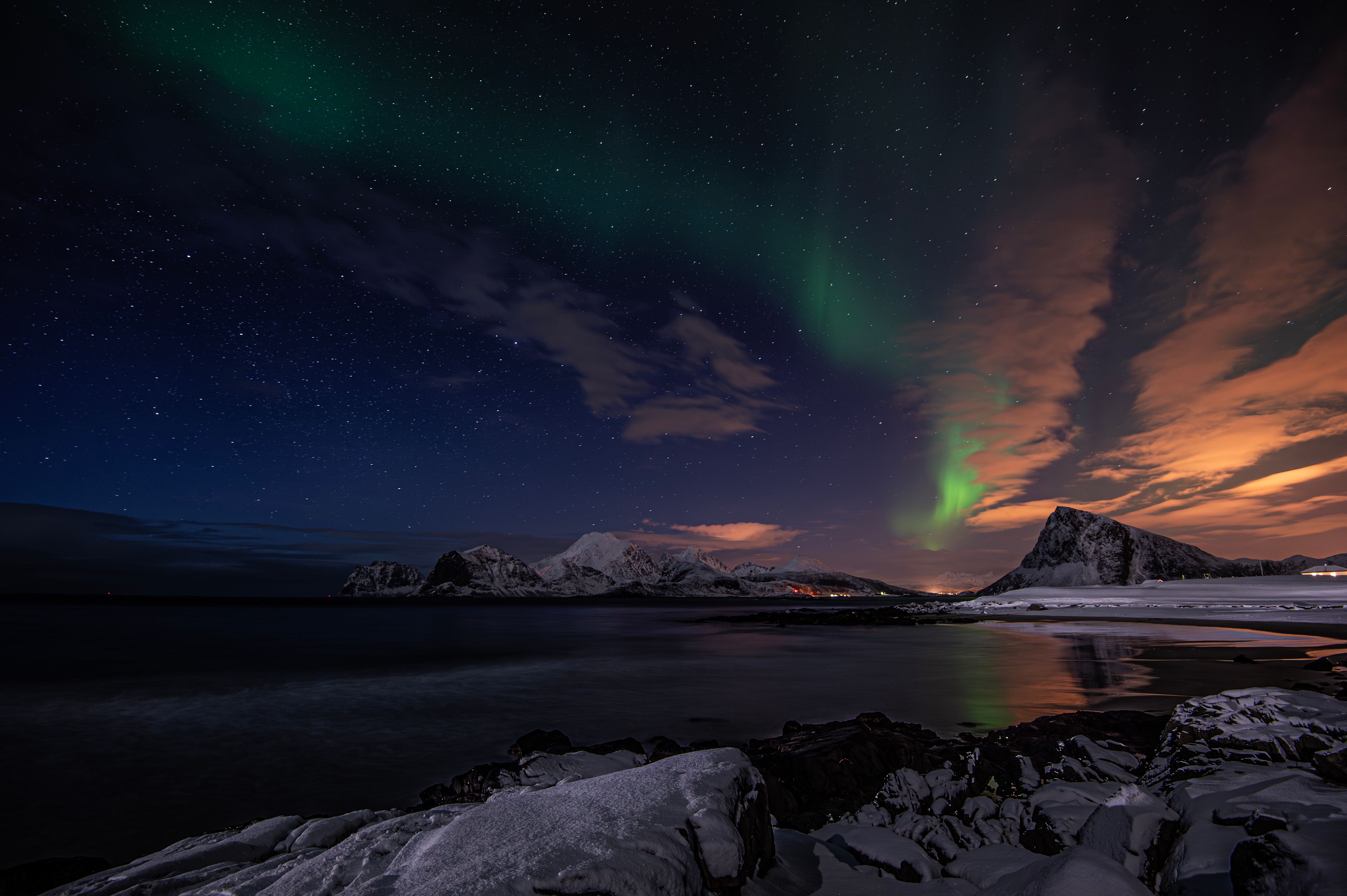 Stunning Northern Lights Over Snowy Mountain Landscape · Free Stock Photo