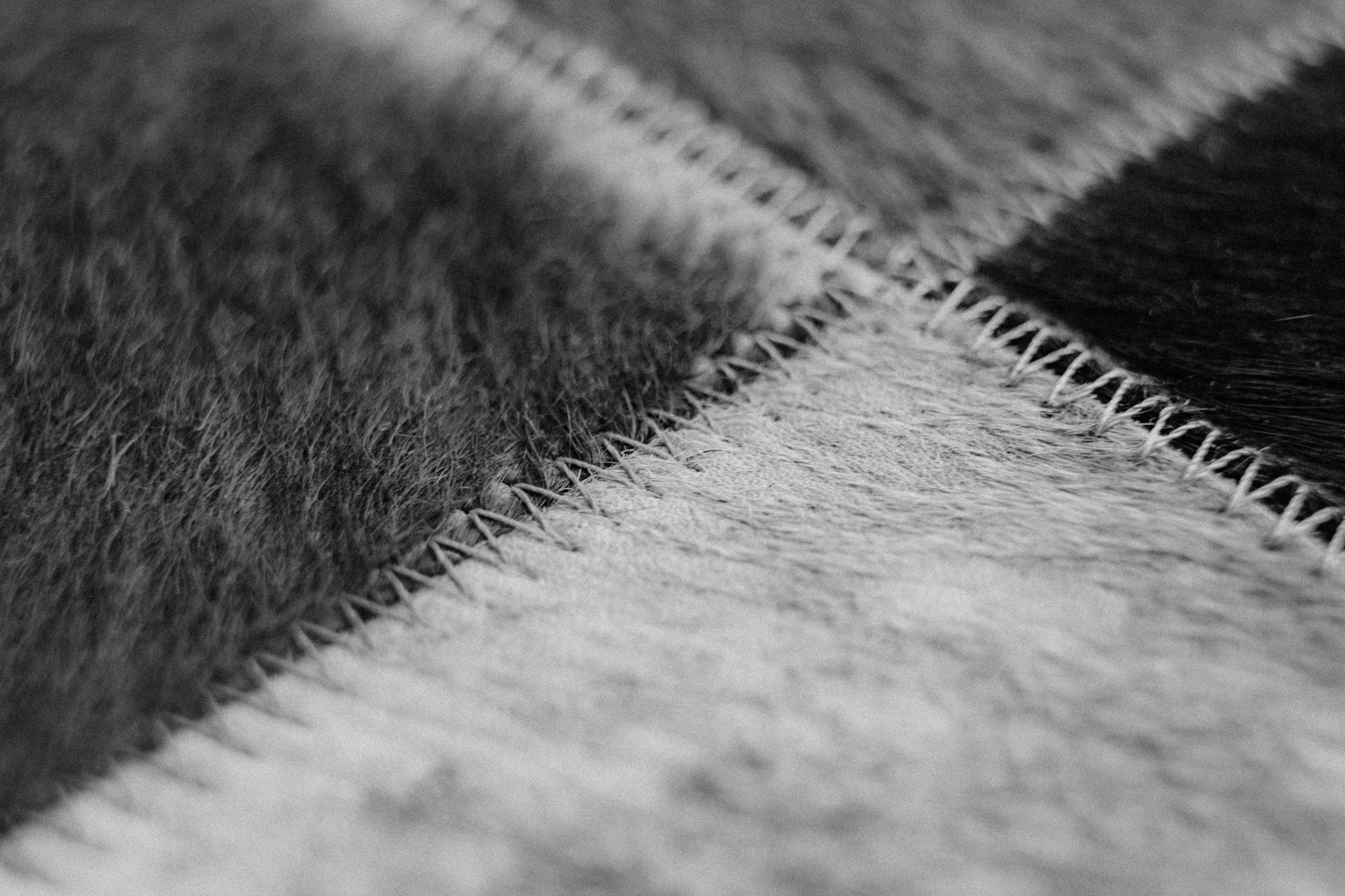 Close-up of hand stitching on fabric
