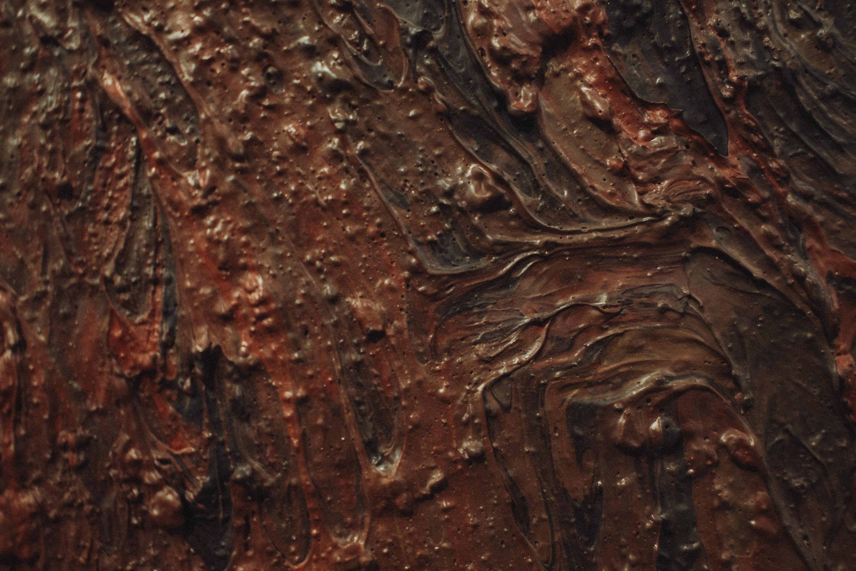 Free A close-up shot of textured abstract painting with earthy browns and reds. Stock Photo