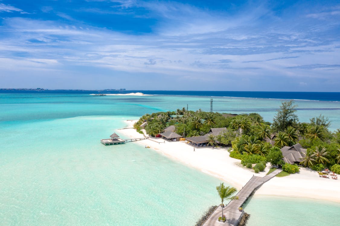 Free A Photo Of Island Reef Of A Surrounding Lagoon Stock Photo