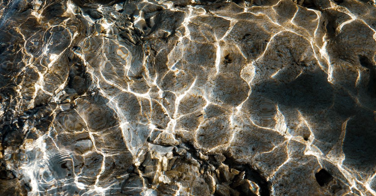 Stream Bed Ripples Abstract Ripples on Rocky Stream Bed · Free Stock Photo