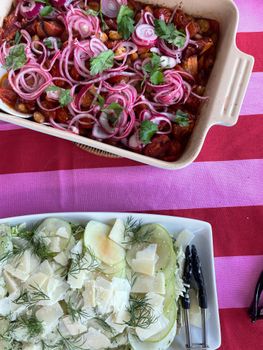 Delight in these colorful salads featuring fresh vegetables, perfect for a summer picnic.