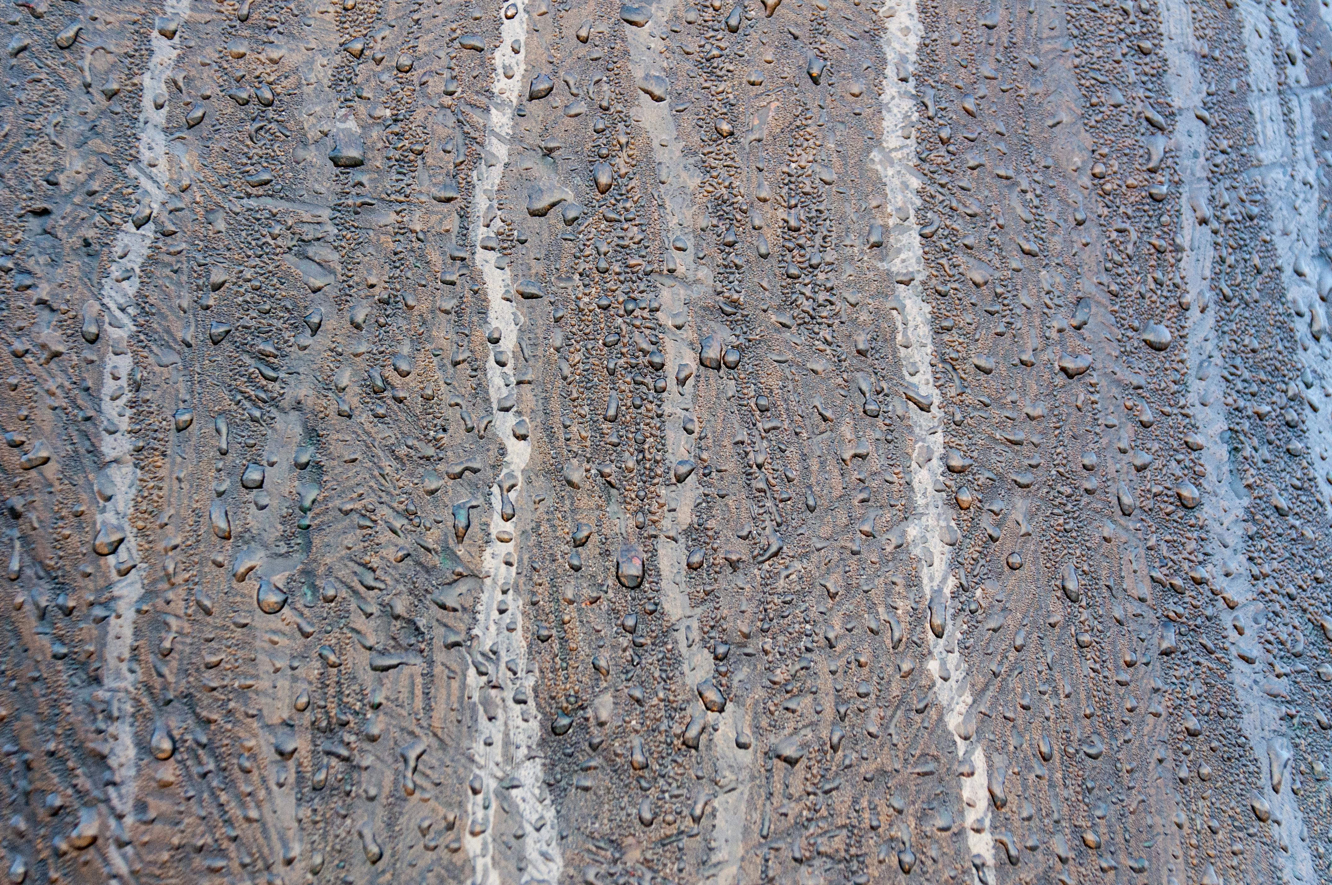 water beading on a professionally sealed paver surface - patio paver sealing
