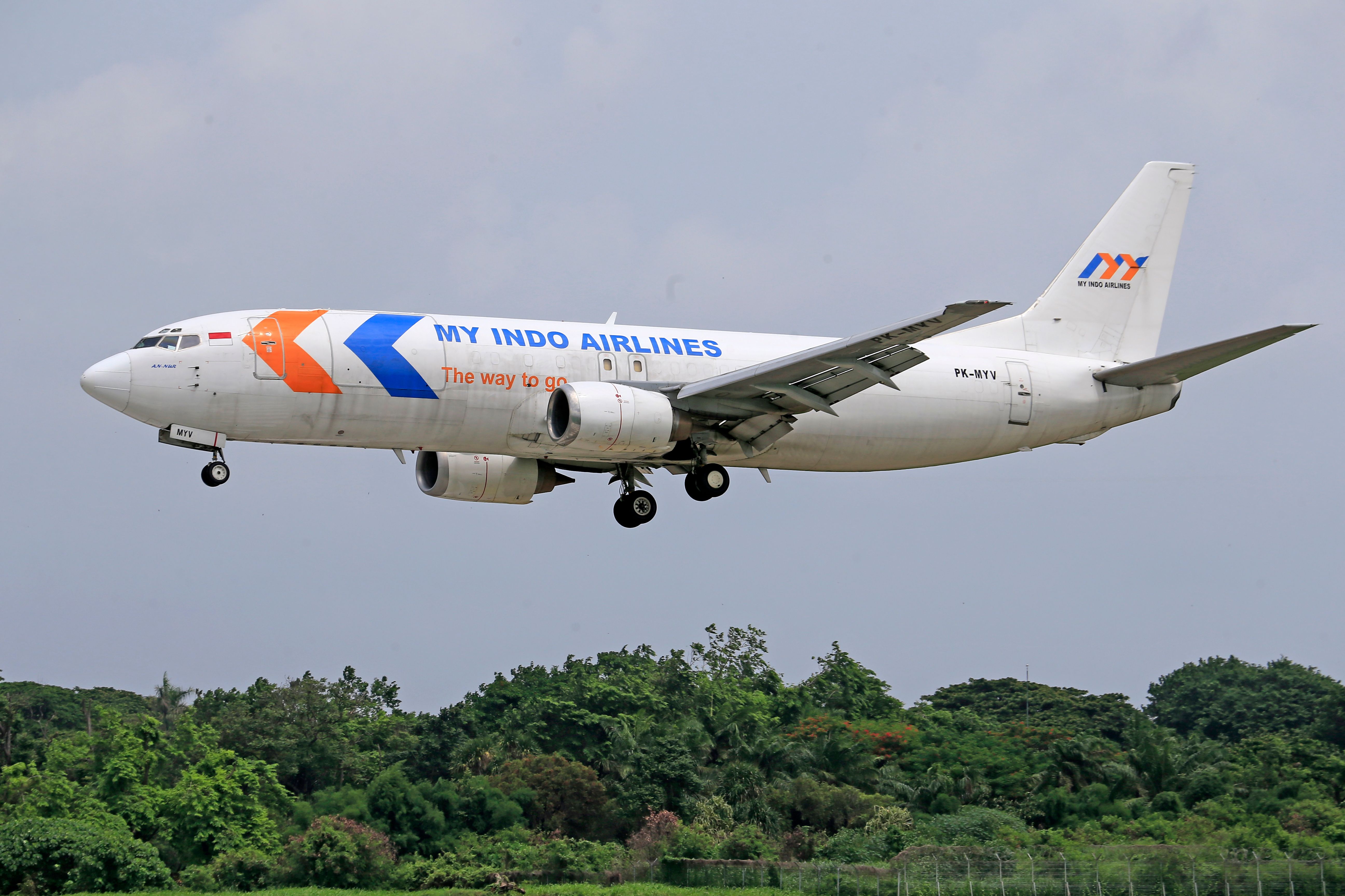 2. Use airline miles/points to upgrade from economy — Photo by Jeffry Surianto on Pexels